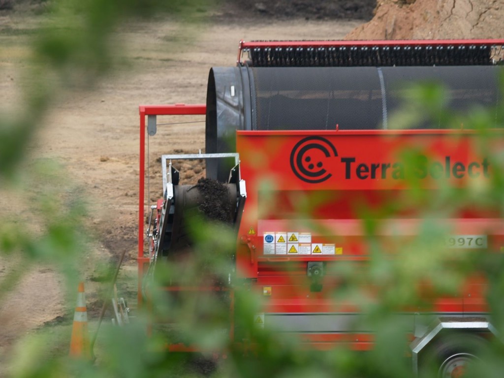 Material coming out of trommel screen after separation