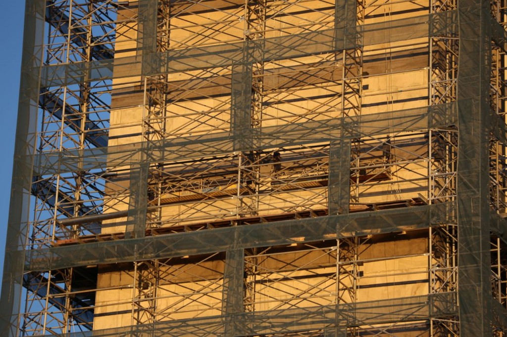 Suspended scaffolding within the supported scaffolding