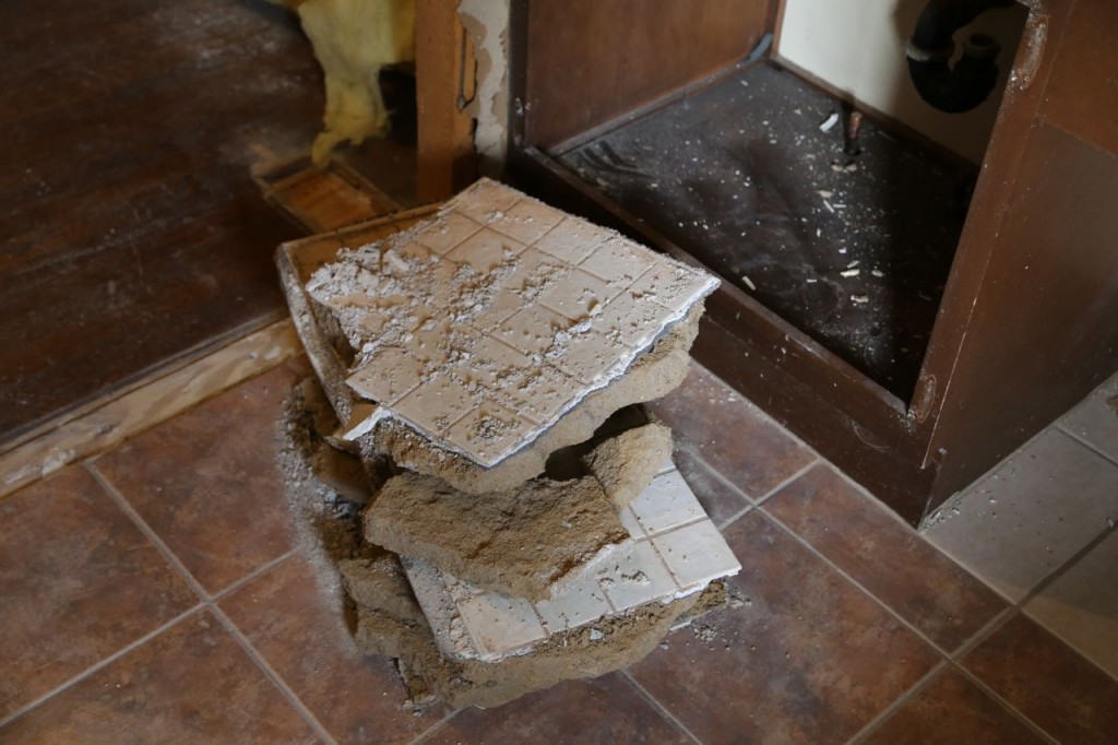 Tile and mortar from the old shower floor