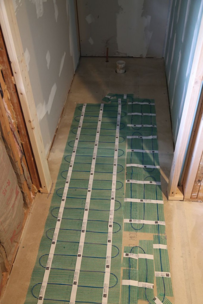 Radiant heat installed down walkway but not where toilet will be.