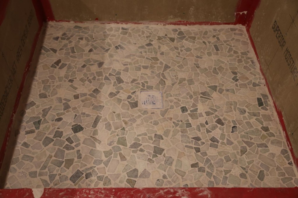 Shower floor tile grouted