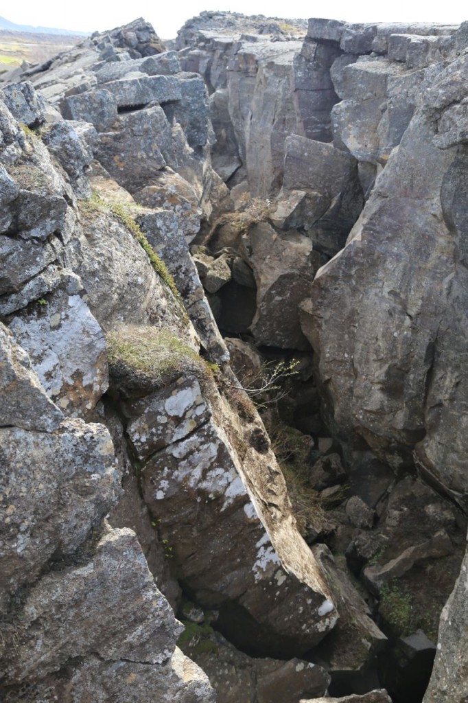 Fissured landscape above the cave