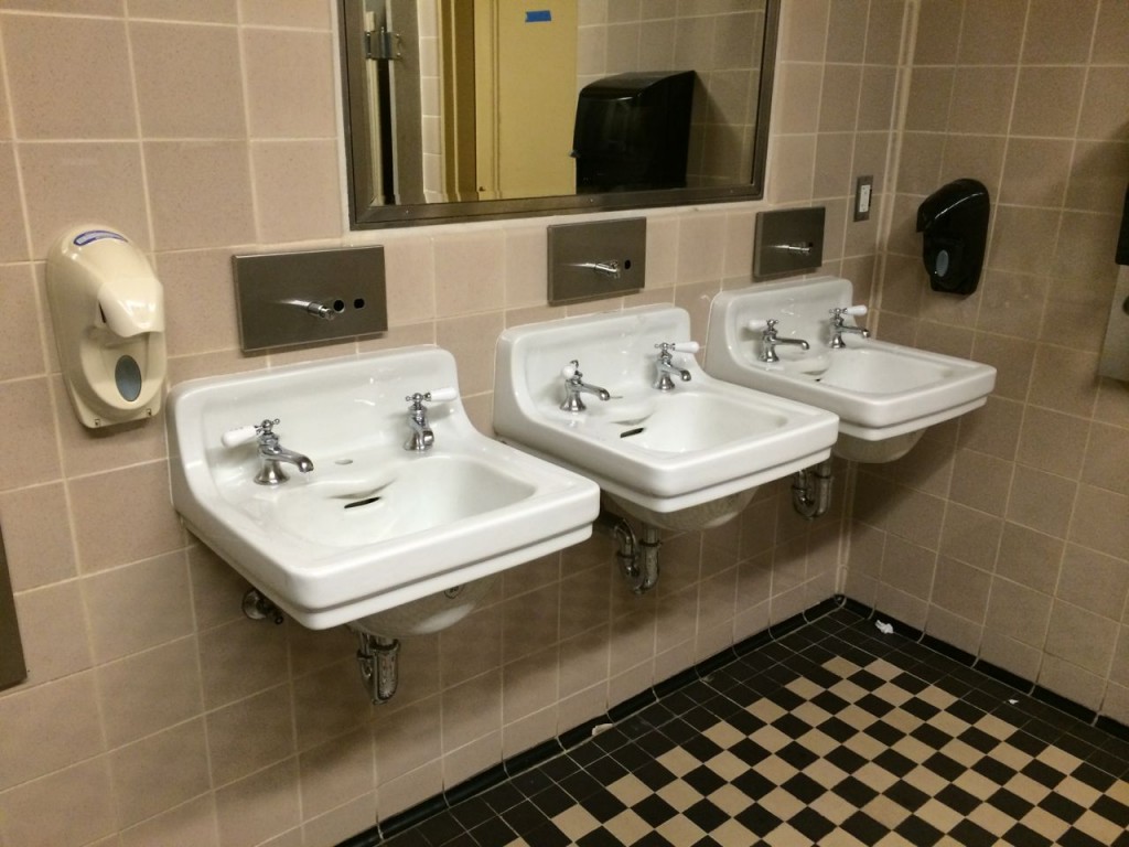 The sinks: 3 sinks with separate hot and cold water faucets and 2 working soap dispensers at the ends