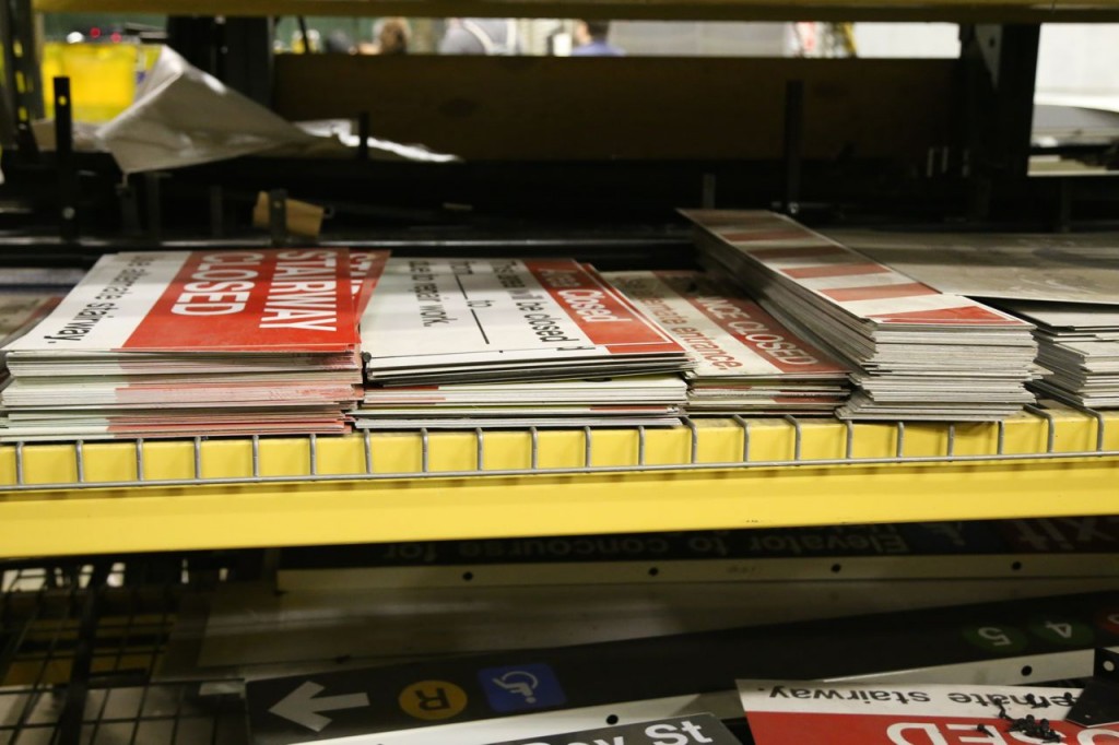 Spare generic signs stacked in storage