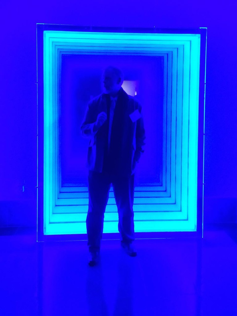 JD Talasek, the curator of Imagining Deep Time, stands in front of Void
