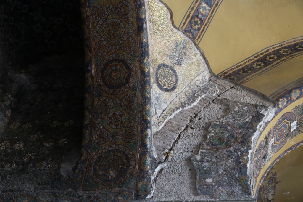 Mosaic revealed under painting