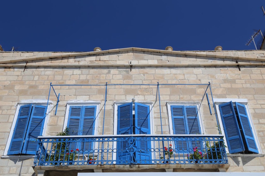 Blue shutters on house
