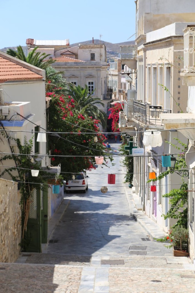 Lampshades cross on alley