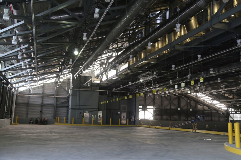 Area where trucks enter and then deposit waste onto mixing floor (right side)