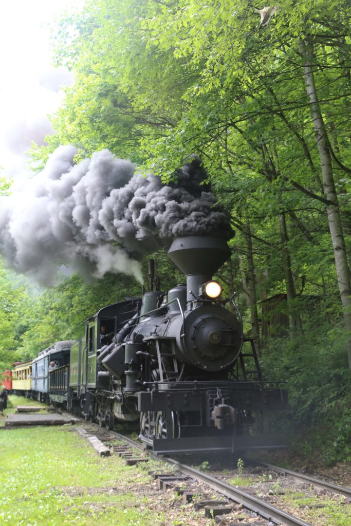 Coal fired steam engine blowing smoke