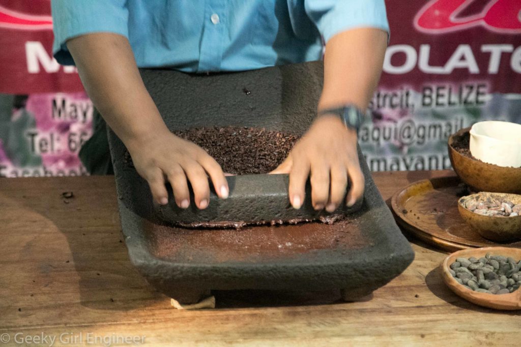 Crushing cacao nibs with liquid starting to form