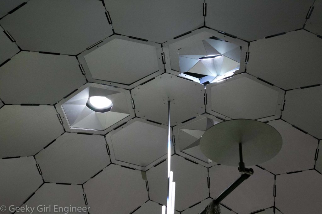 Ceiling with tubes outputting sunlight and reflectors below