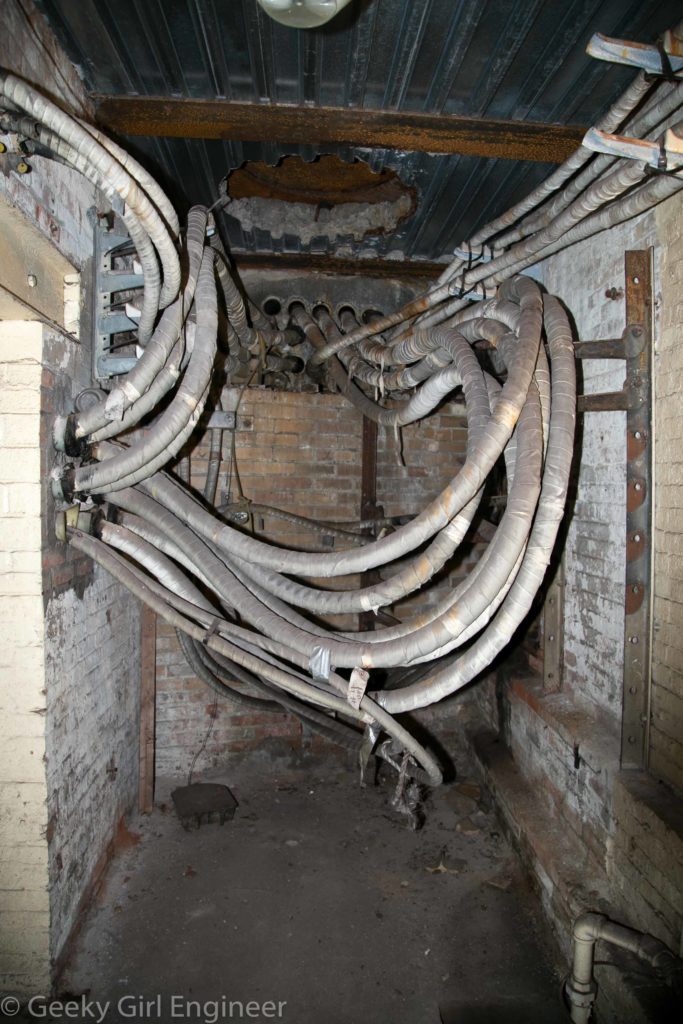 Cables leave the substation through the vault under the street with manhole access