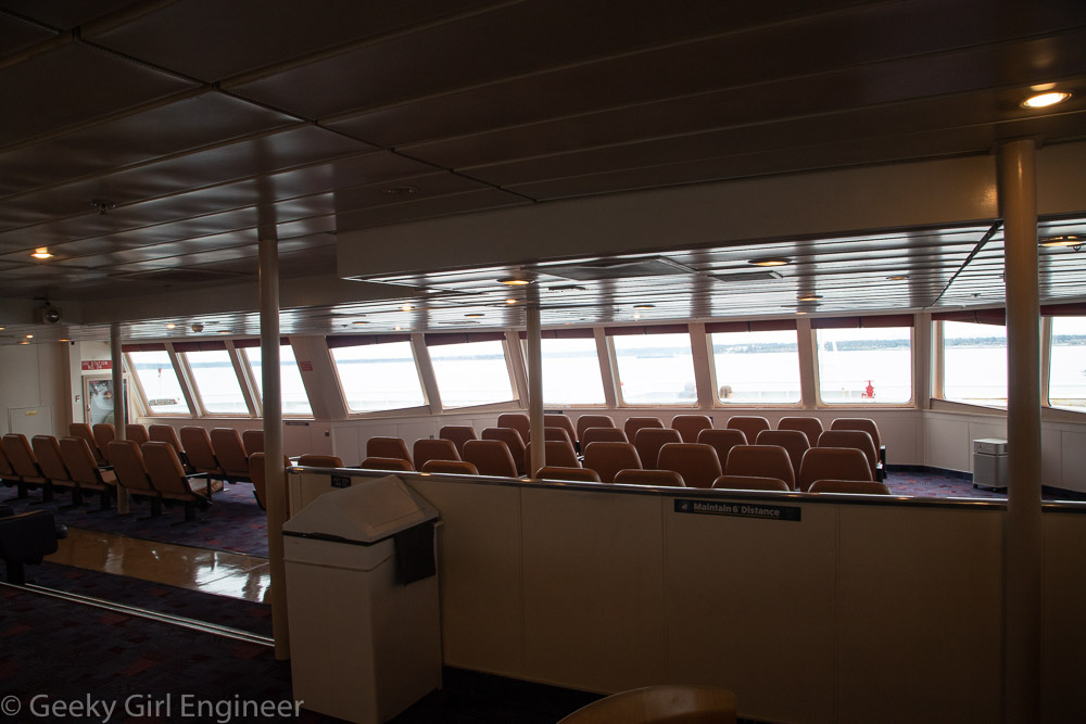 Seats facing the front window of a ship