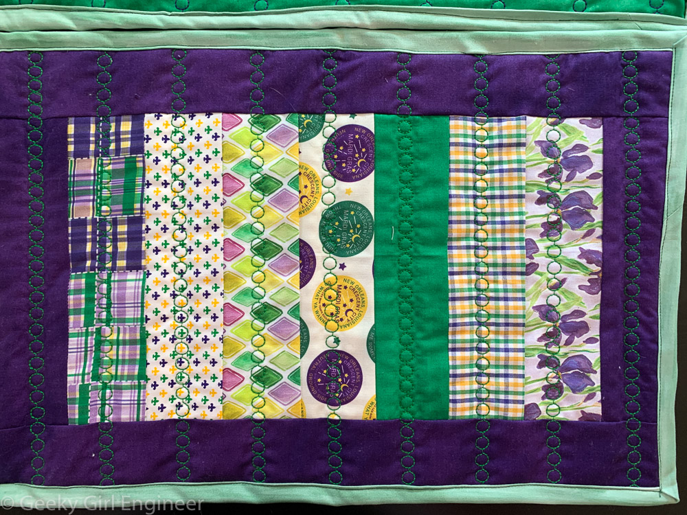Mardi Gras themed fabric sewed in simple strips